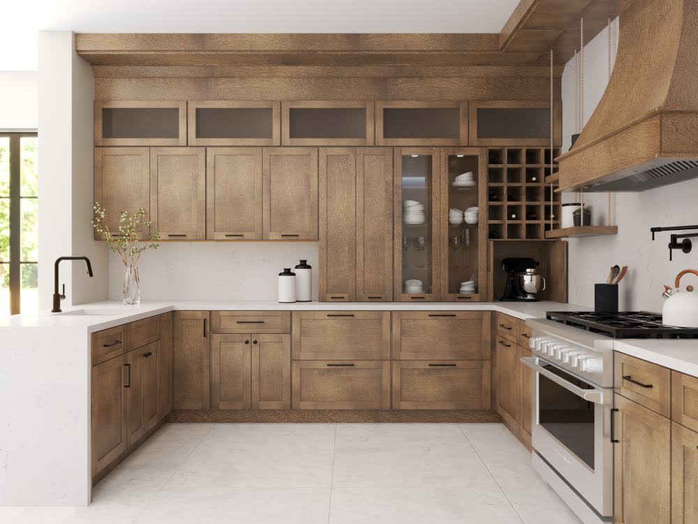 Rustic wood kitchen cabinets shown in a finished kitchen — rustic wood-grain doors