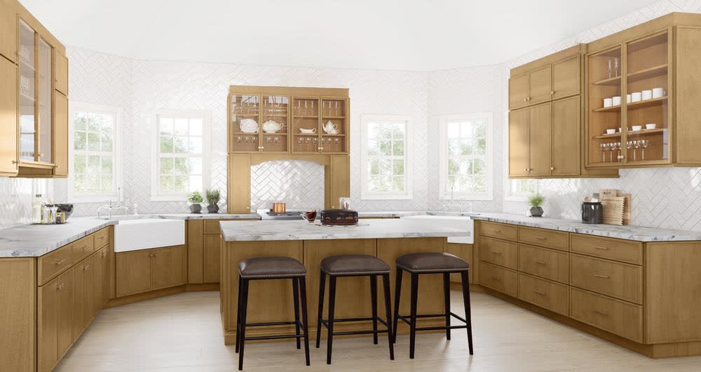 Treasure Chest kitchen cabinets shown in a finished kitchen — honey oak doors