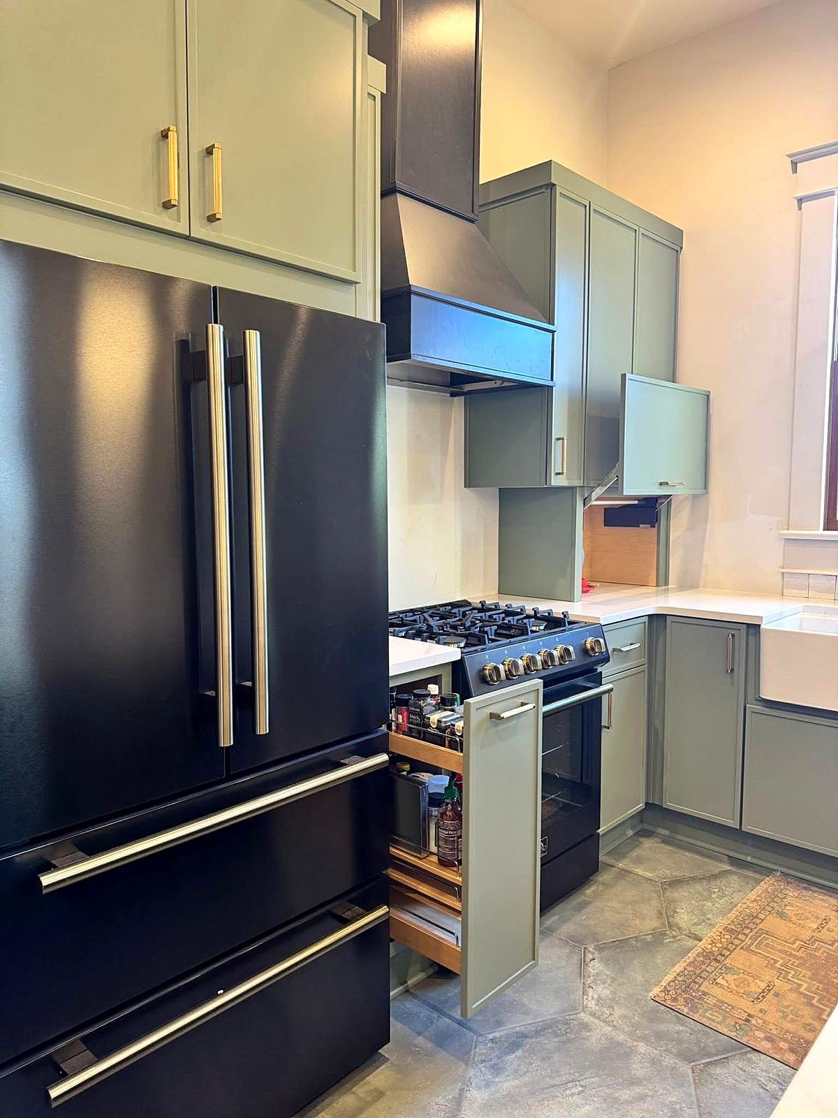 Navy and sage two-tone kitchen cabinets, an alternative to all-white
